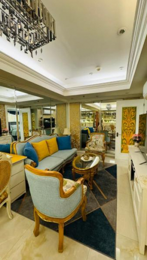 Cozy 54 sqm one bedroom unit with very fast WI-FI and sunset skyline view